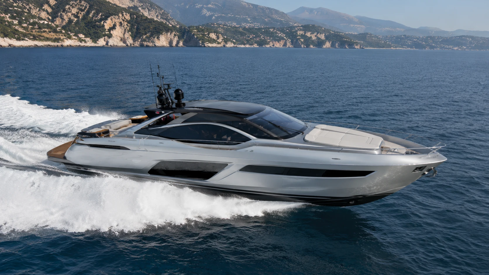 A high-performance motor yacht cutting across open water